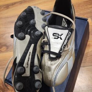 Umbro Women's XAI V LGE- IN Gold and Black Athletic Shoes